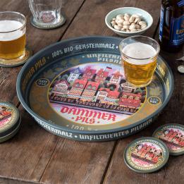 Round metal serving tray with vintage German beer design and colorful town illustration