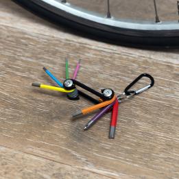 7-in-1 multi-coloured multi-tool with hex keys and screwdriver bits