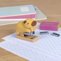 Capybara-shaped stapler with a small box of staples beside it