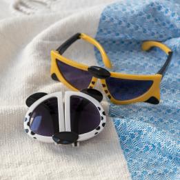 sunglasses with white snow leopard and yellow tiger design.