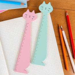 Aqua blue and pink ruler shaped like a sitting cat