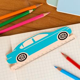 A blue ruler shaped like a car, with measurement markings along the bottom edge