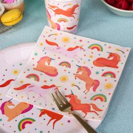 Pink unicorn-themed paper napkins displayed with matching cup and plate.