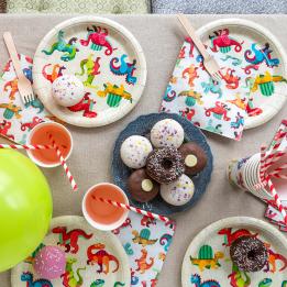 Dinosaur-themed party paper plate, cup and napkins.