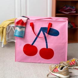 Large pink storage bag with a bold cherry graphic and red handles.