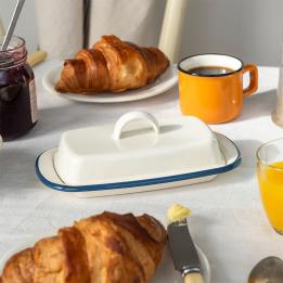 Rectangular white enamel butter dish with a blue rim and a handled lid
