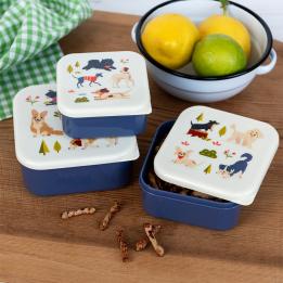 A set of three snack boxes featuring dog park illustrations.