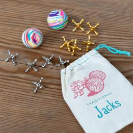 Traditional jacks set with drawstring bag, two striped balls, and gold and silver jacks.