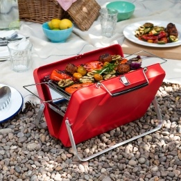 Portable red suitcase-style BBQ 