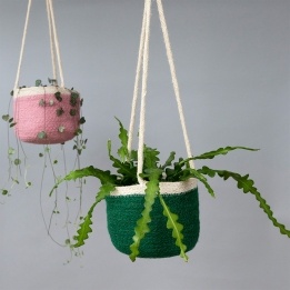 Green seagrass hanging basket with hanging loop.