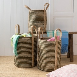 Set of three striped storage baskets with handles in assorted sizes.