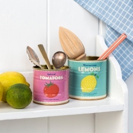 Decorative storage tins labelled "Spiced Tomatoes" and "Moroccan Lemons"