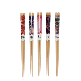 five pairs of wooden chopsticks with colorful floral designs