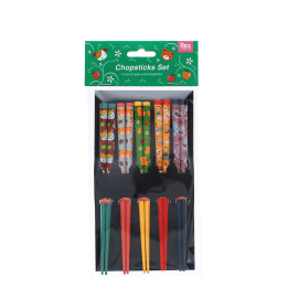 Set of five pairs of colorful chopsticks with cute animal and fruit designs in a packaging