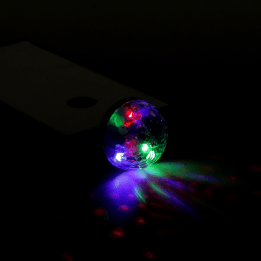 USB‑C plug‑in disco light showing with the light on.