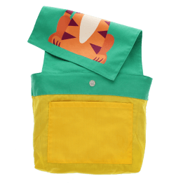 Inside of children’s backpack showing yellow lining, inner pocket, snap closure, and patterned flap