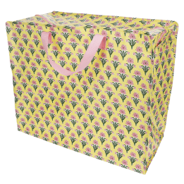 Yellow jumbo storage bag with a pink floral pattern and pink handles.
