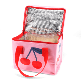 Pink insulated lunch bag with a bold cherry design and red handles, shown open with a silver foil-lined interior.