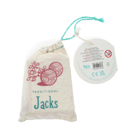 Traditional Jacks in a drawstring bag with a tag showing safety warnings.