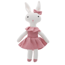 Knitted rabbit toy with long ears, wearing a pink dress with a ruffled collar and a matching bow on one ear