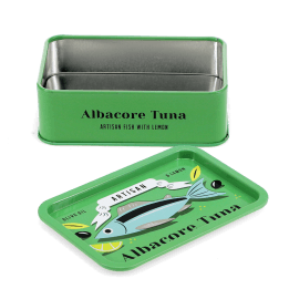 Open mini storage tin with the lid beside it, featuring an illustrated tuna on the lid.