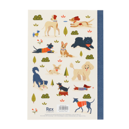 Notebook with illustrated dogs in a park scene on the cover.