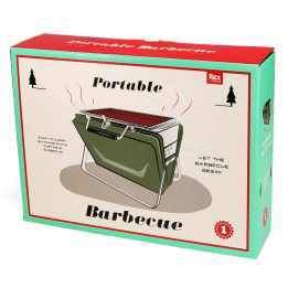 Portable charcoal grill with metal grate and foldable legs shown with packaging