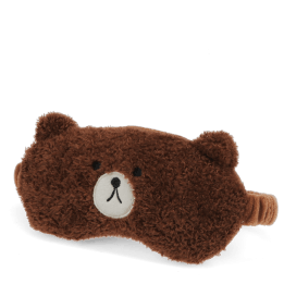 Brown plush teddy bear–shaped travel eye mask with embroidered facial features.