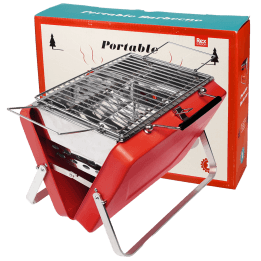 Red portable bbq suitcase placed with a retail box