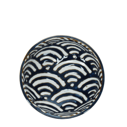 Round ceramic bowl with white wave pattern interior