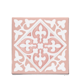 Pink ceramic coaster with white ornate tile pattern.