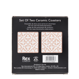 Back of boxed set of two pink ceramic coasters with pattern, branding, and barcode.