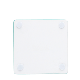 Back of turquoise ceramic coaster with four corner foam pads to prevent surface scratches.