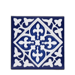 Blue ceramic coaster with embossed pattern.