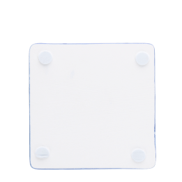 Back of blue ceramic coaster with four corner foam pads to prevent surface scratches.