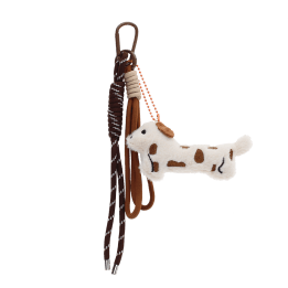 Plush sausage dog bag charm with brown spots, cord strap and clip.