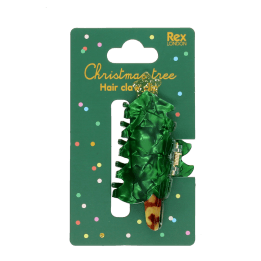Green Christmas tree-shaped hair claw clip on festive retail packaging.