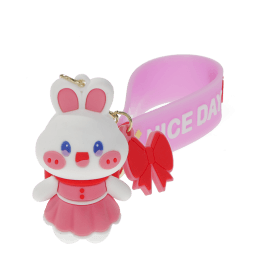 Bunny bag charm with pink outfit, silicone wrist strap and bow detail
