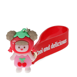 Copilot said:  Cherry girl bag charm with red cherry hat, pink outfit, silicone wrist strap and keyring