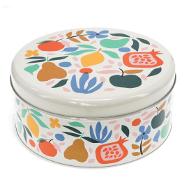 Round cake tin with a colourful fruit and floral pattern