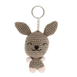 Crochet rabbit keyring with long ears and a silver metal keyring attachment.