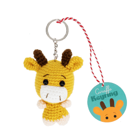 Crochet giraffe keyring with small horns and a silver metal keyring attachment with tag.