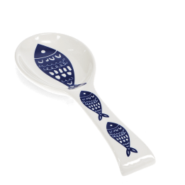 White ceramic spoon rest with blue fish design.