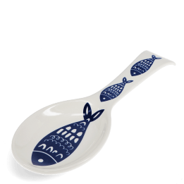 White ceramic spoon rest with blue fish design.