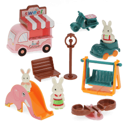 Ice Cream Playground playset with toy ice cream van, slide, swing and bunny figures.