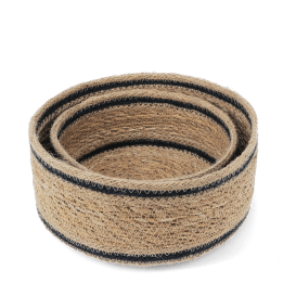 Set of two round woven storage baskets with black stripe detail.