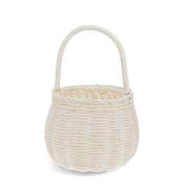 Natural wicker basket in white with twisted handle for storage