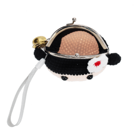 Crochet girl-shaped coin purse with a metal clasp and hanging bell charm with tag.