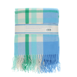 Blue, green and white check blanket folded.