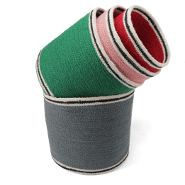 Set of four nested woven jute baskets in grey, green, pink and red